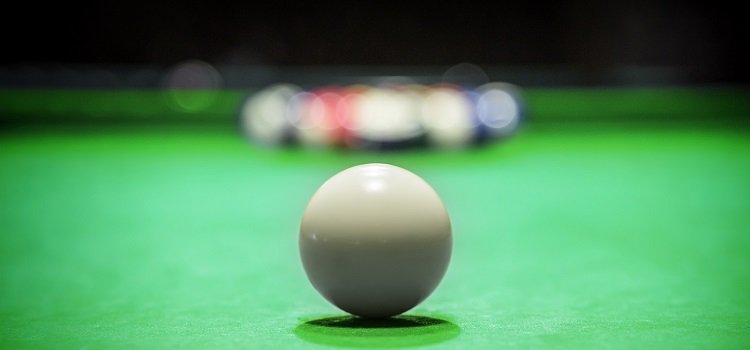 Billiard Balls. A Vintage style photo from a billiard balls in a pool table. Noise added for a film effect ** Note: Shallow depth of field